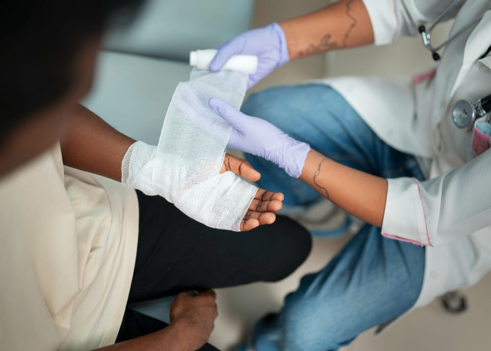 Nurse dressing a wound